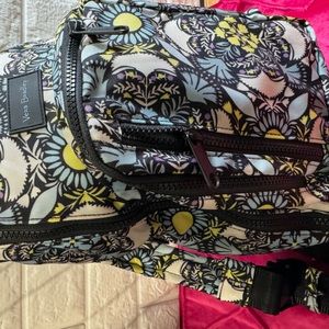 Vera Bradley floral print sling bag.